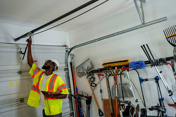 Professional Garage Door Panel Replacement technician working in Denver City, TX